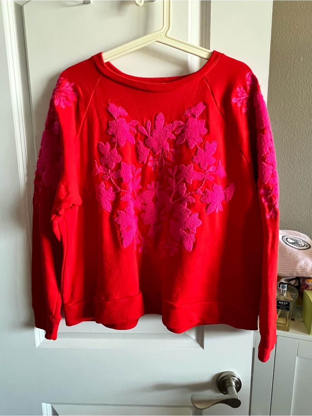 H&M Red Crewneck Sweatshirt with Pink Floral Appliqué